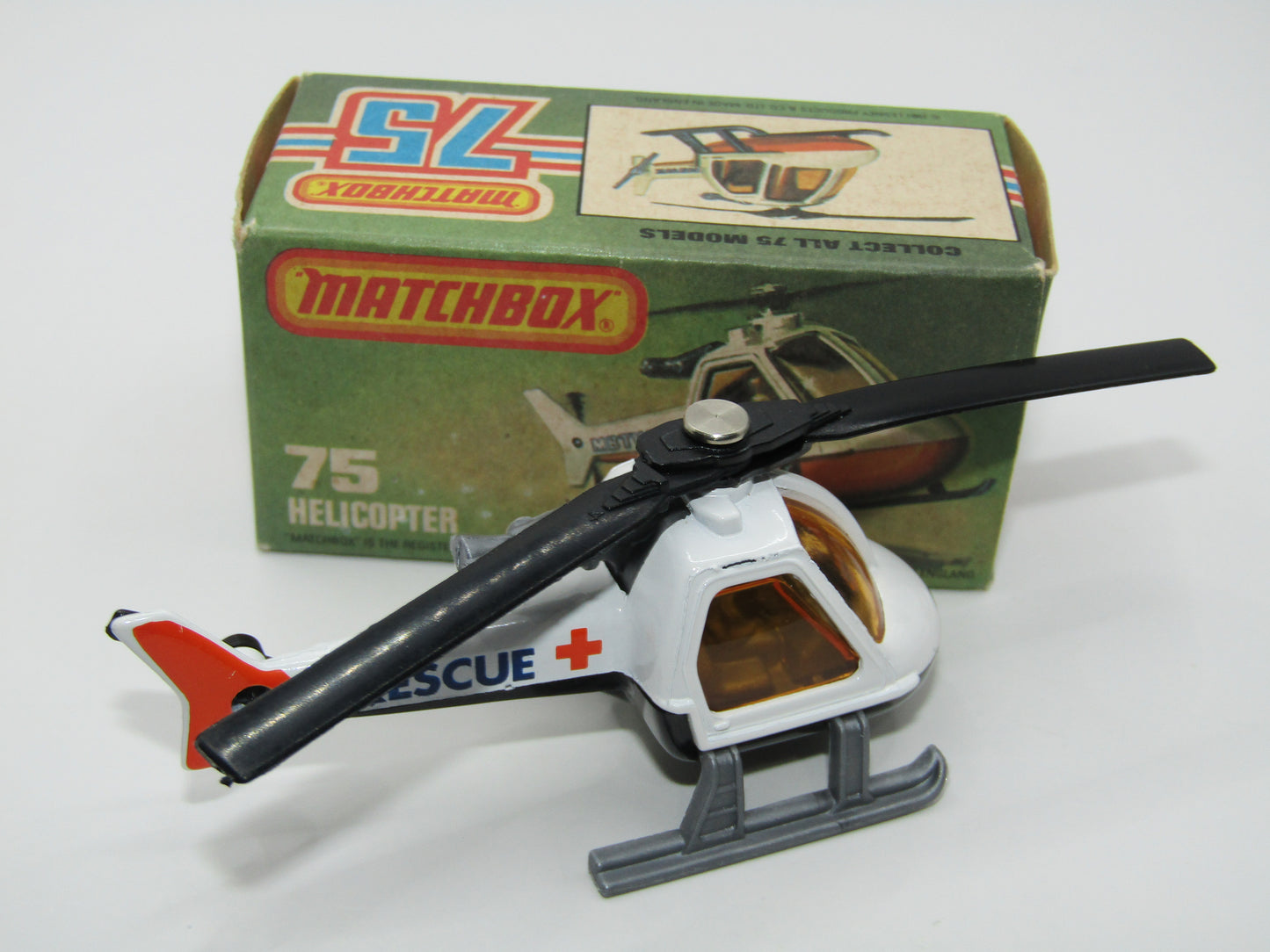 Matchbox Superfast 75D Helicopter "Recue Tampo" Amber Glass and Silver Legs