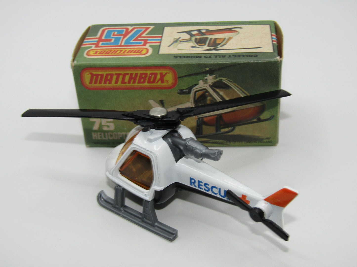 Matchbox Superfast 75D Helicopter "Recue Tampo" Amber Glass and Silver Legs