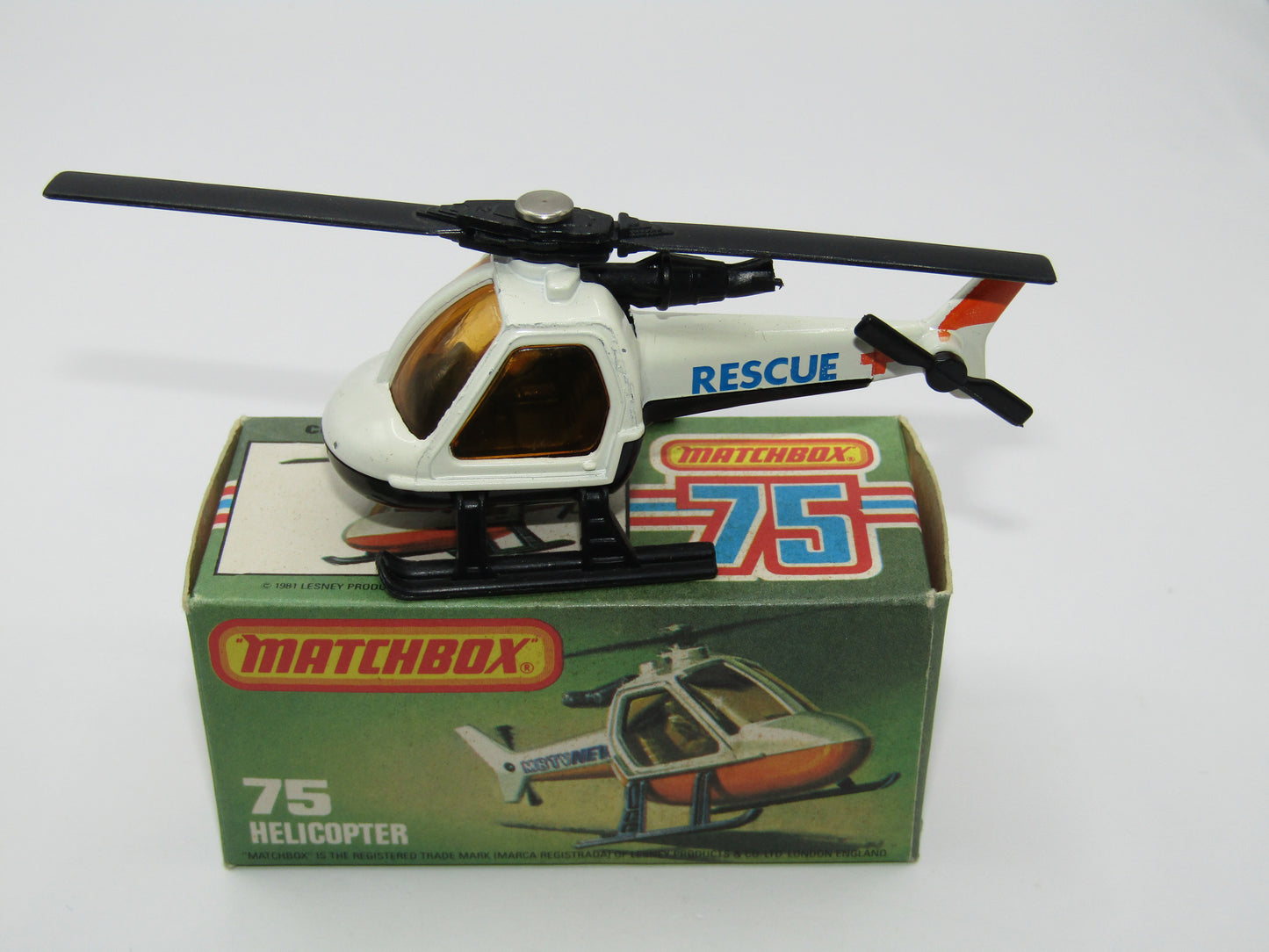 Matchbox Superfast 75D Helicopter "Recue Tampo" Amber Glass and Black Legs