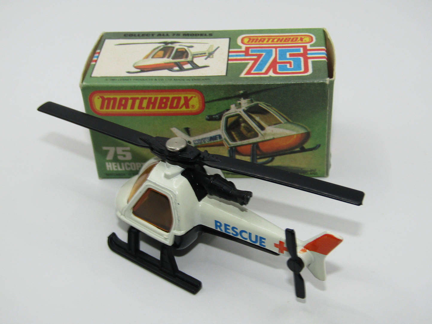 Matchbox Superfast 75D Helicopter "Recue Tampo" Amber Glass and Black Legs
