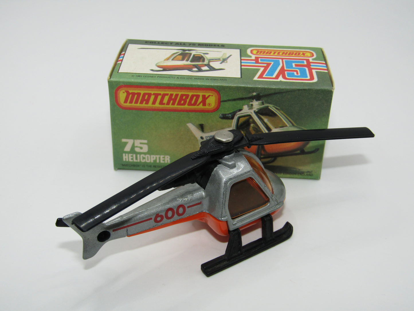 Matchbox Superfast 75D Helicopter "600 Tampo" Amber Glass, Black Legs Orange Base