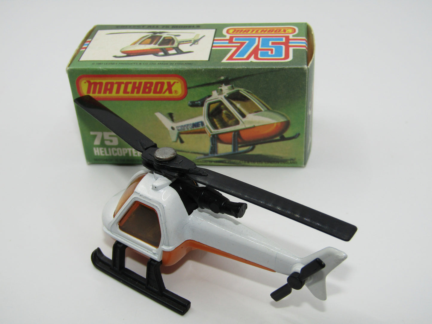 Matchbox Superfast 75D Helicopter "NO TAMPO" Amber Glass, Black Legs Orange Base