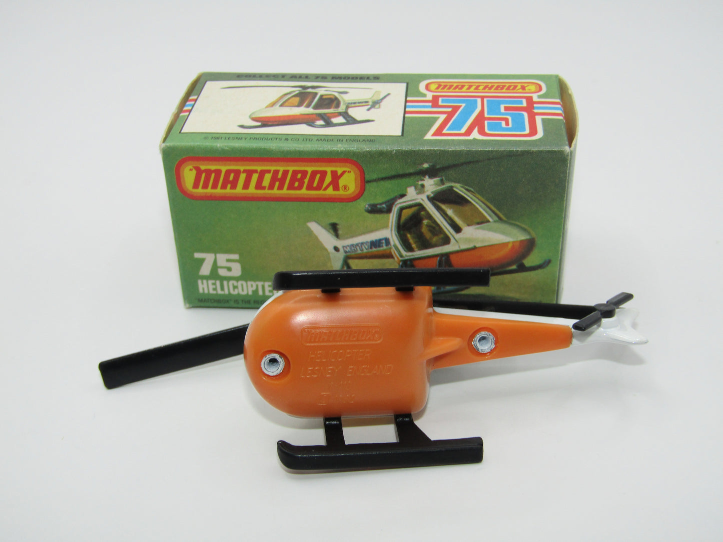 Matchbox Superfast 75D Helicopter "NO TAMPO" Amber Glass, Black Legs Orange Base