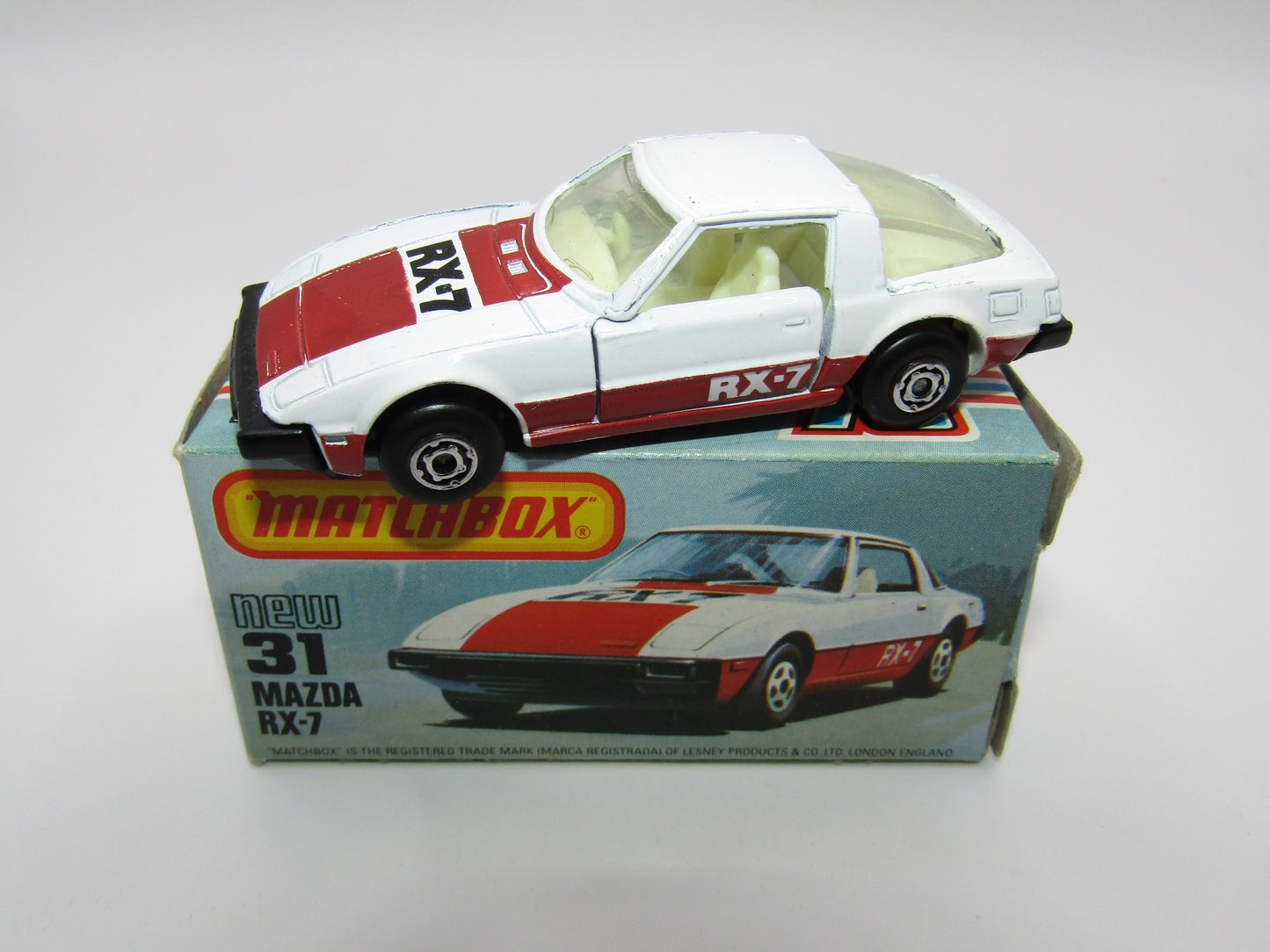 Matchbox Superfast No 31D Mazda RX-7 MALTESE CROSS Wheels Thick Red Stripe USA Picture Box