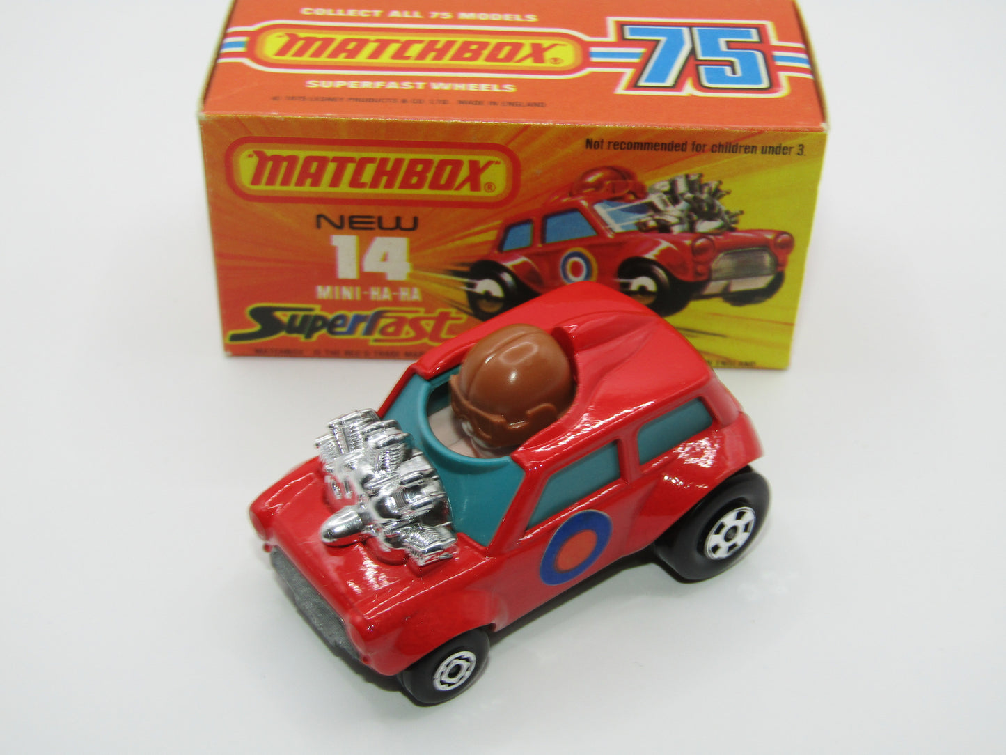 Matchbox Superfast No 14B Mini Ha-Ha LIGHT PINK Driver, Light Brown Helmet, 2 Colour Labels , GREEN Windows, Not Recommeded Box