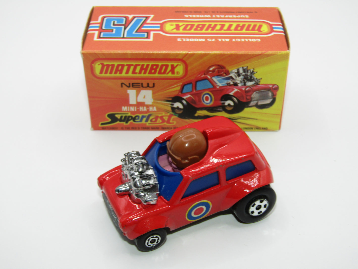 Matchbox Superfast No 14B Mini Ha-Ha DARK BLUE Windows, PURPLE Driver Light Brown Helmet